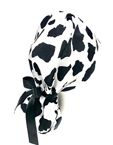 Шапчица-търкане на Конска опашка с грандиозно черно-бели шарени крави. Изберете атласную панделка за вратовръзка отзад